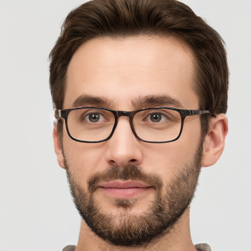 Neutral white young-adult male with short  brown hair and green eyes