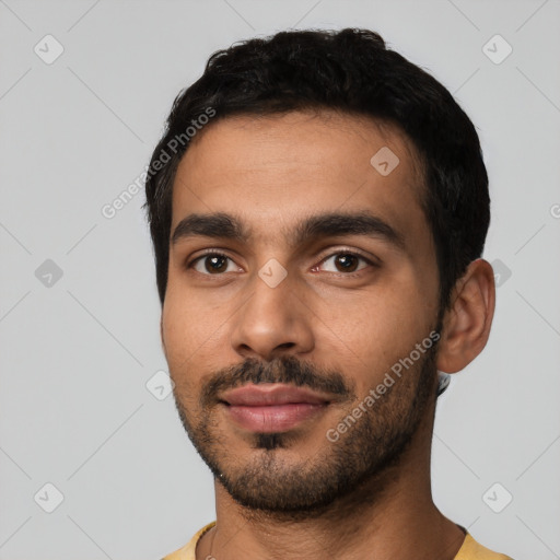 Neutral latino young-adult male with short  black hair and brown eyes
