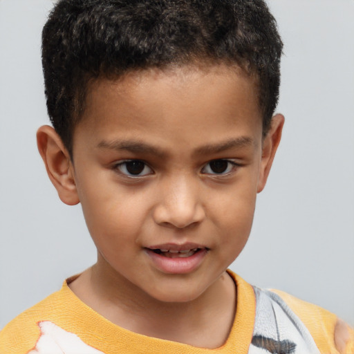 Joyful white child male with short  brown hair and brown eyes