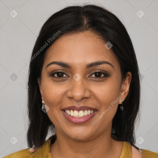 Joyful black young-adult female with medium  brown hair and brown eyes