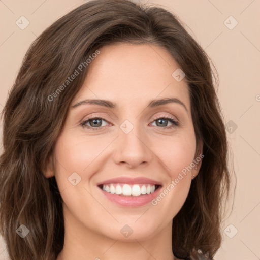 Joyful white young-adult female with medium  brown hair and green eyes