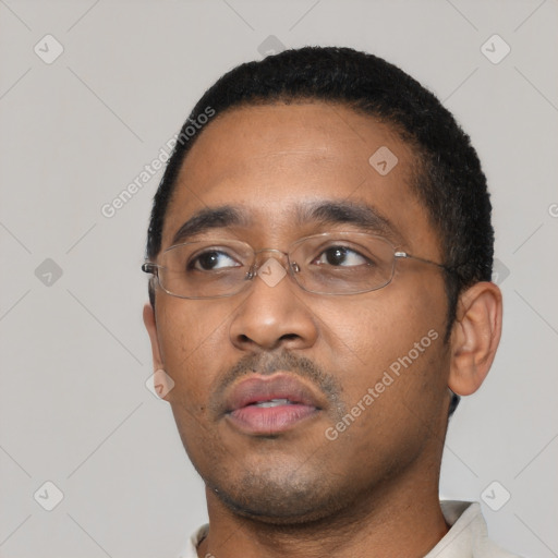 Neutral black young-adult male with short  black hair and brown eyes