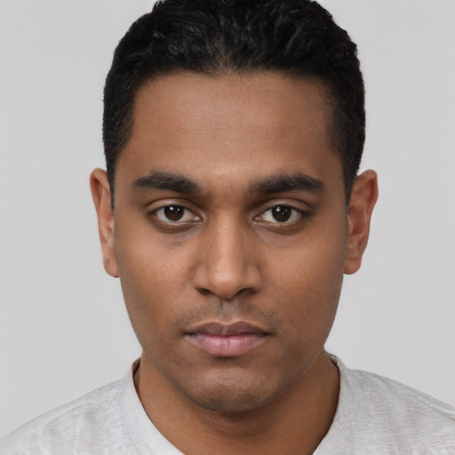 Neutral latino young-adult male with short  black hair and brown eyes