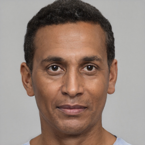 Neutral latino adult male with short  black hair and brown eyes