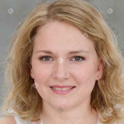 Joyful white young-adult female with medium  brown hair and blue eyes