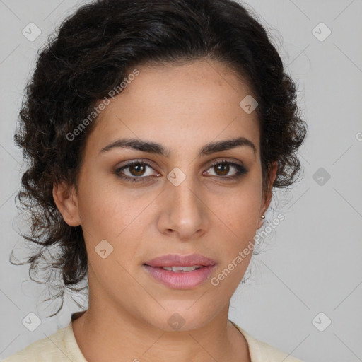 Joyful latino young-adult female with medium  brown hair and brown eyes