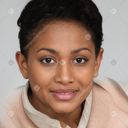 Joyful black young-adult female with short  brown hair and brown eyes