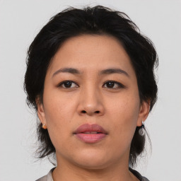 Neutral asian young-adult female with medium  black hair and brown eyes