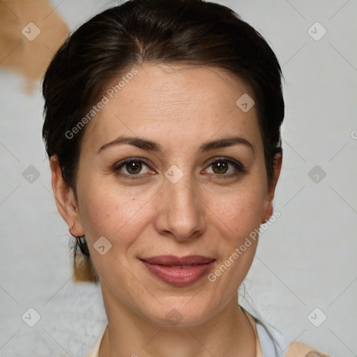 Joyful white adult female with medium  brown hair and brown eyes