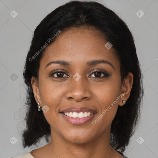 Joyful black young-adult female with medium  black hair and brown eyes