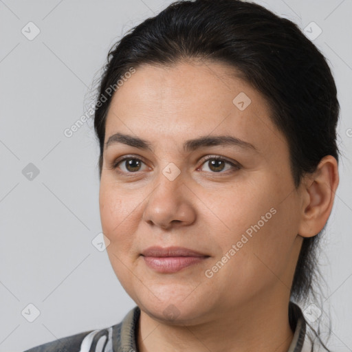 Joyful white adult female with medium  brown hair and brown eyes