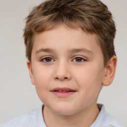 Joyful white child male with short  brown hair and brown eyes