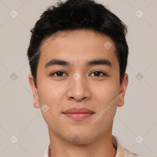Joyful latino young-adult male with short  black hair and brown eyes