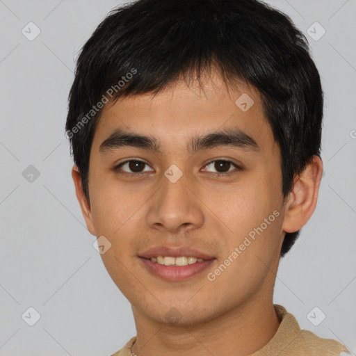 Joyful asian young-adult male with short  black hair and brown eyes