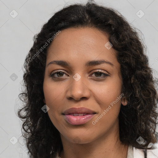 Joyful latino young-adult female with long  brown hair and brown eyes