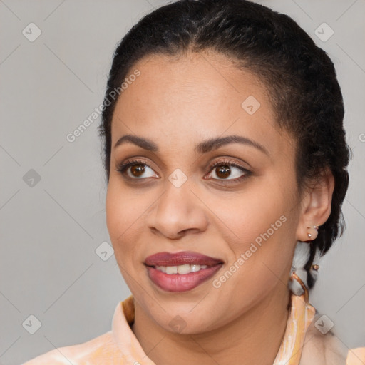 Joyful latino young-adult female with short  brown hair and brown eyes