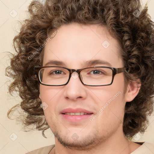 Joyful white young-adult male with medium  brown hair and brown eyes