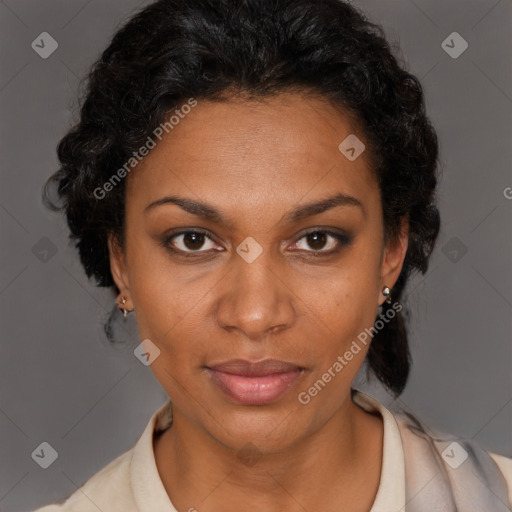 Joyful black adult female with short  brown hair and brown eyes