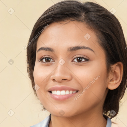 Joyful white young-adult female with medium  brown hair and brown eyes