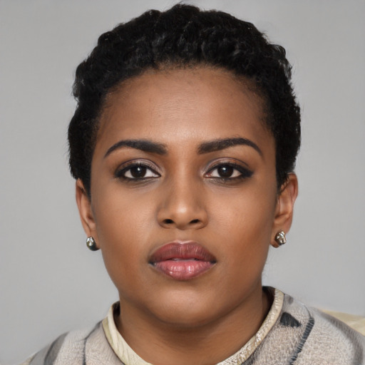 Neutral black young-adult female with short  black hair and brown eyes
