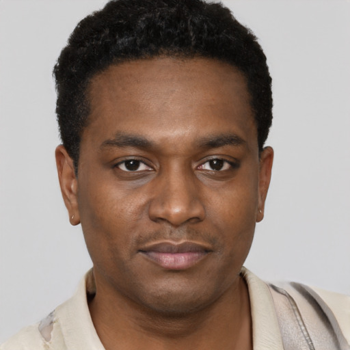 Neutral black young-adult male with short  brown hair and brown eyes