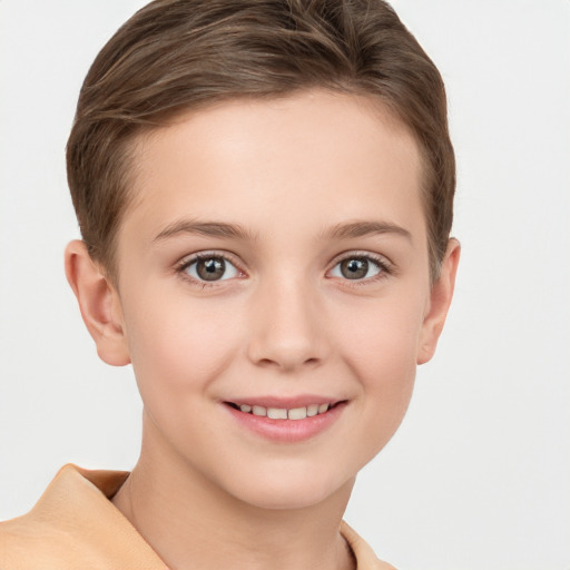 Joyful white child female with short  brown hair and brown eyes