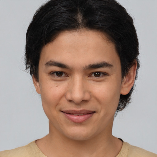 Joyful asian young-adult female with medium  brown hair and brown eyes