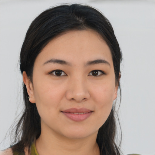 Joyful asian young-adult female with medium  brown hair and brown eyes