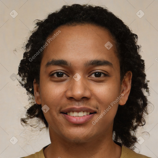 Joyful black young-adult male with short  brown hair and brown eyes