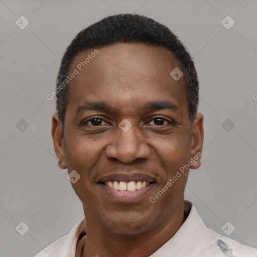 Joyful latino adult male with short  black hair and brown eyes