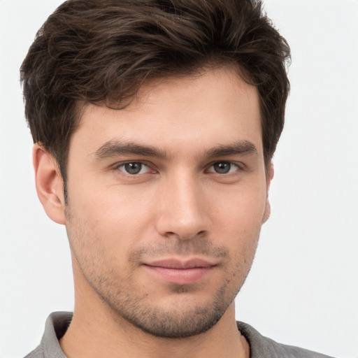 Neutral white young-adult male with short  brown hair and brown eyes