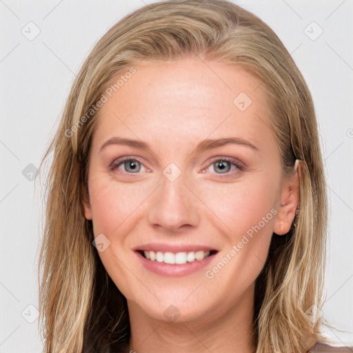 Joyful white young-adult female with long  brown hair and grey eyes