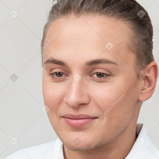 Joyful white young-adult female with short  brown hair and brown eyes