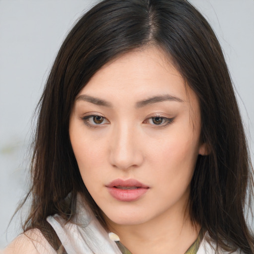 Neutral asian young-adult female with long  brown hair and brown eyes