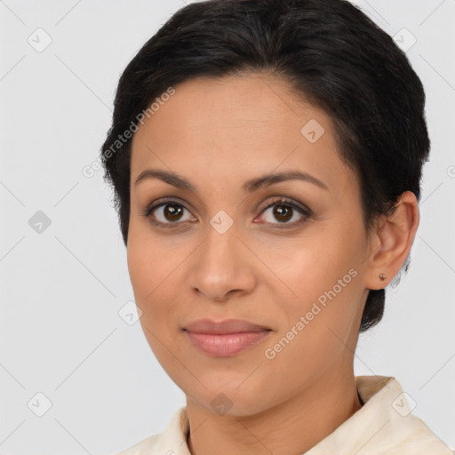 Joyful latino young-adult female with short  brown hair and brown eyes