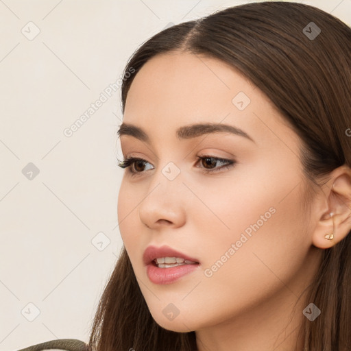 Neutral white young-adult female with long  brown hair and brown eyes