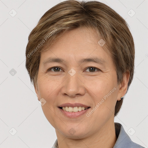 Joyful white adult female with short  brown hair and brown eyes