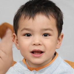 Joyful white child male with short  brown hair and brown eyes