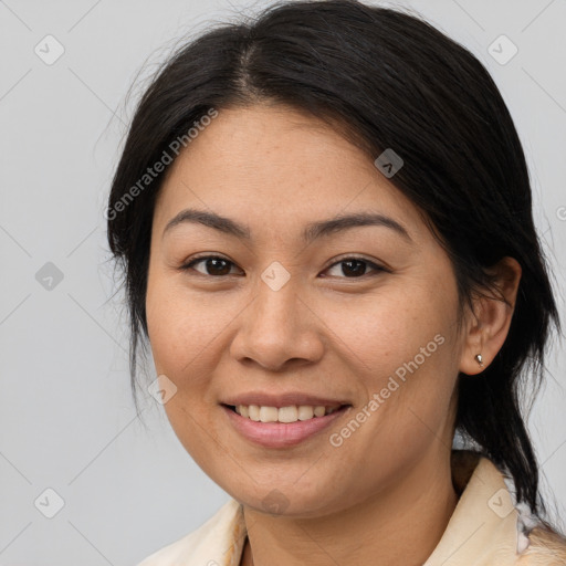 Joyful asian young-adult female with medium  brown hair and brown eyes