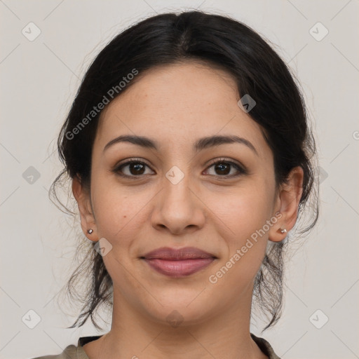 Joyful latino young-adult female with medium  brown hair and brown eyes