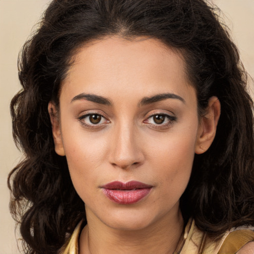 Joyful white young-adult female with long  brown hair and brown eyes