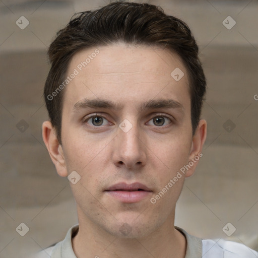 Neutral white young-adult male with short  brown hair and brown eyes