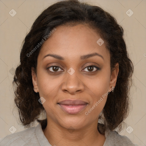 Joyful black young-adult female with medium  brown hair and brown eyes