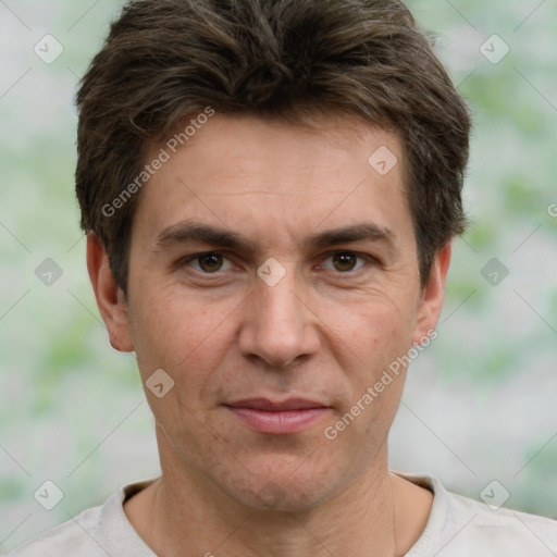 Joyful white adult male with short  brown hair and grey eyes