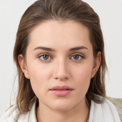 Neutral white young-adult female with medium  brown hair and brown eyes