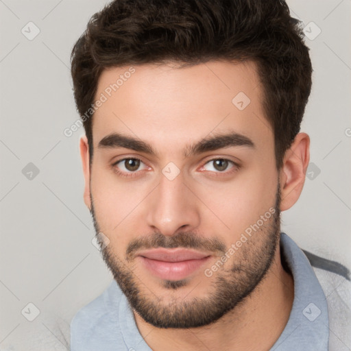 Neutral white young-adult male with short  brown hair and brown eyes