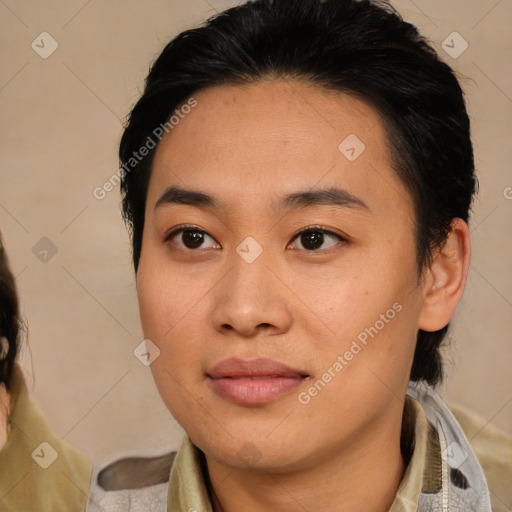 Joyful asian young-adult female with medium  brown hair and brown eyes