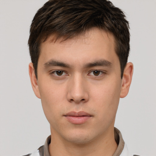 Neutral white young-adult male with short  brown hair and brown eyes