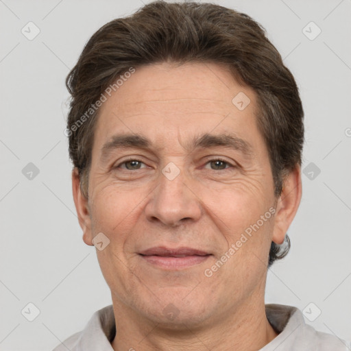 Joyful white middle-aged male with short  brown hair and brown eyes