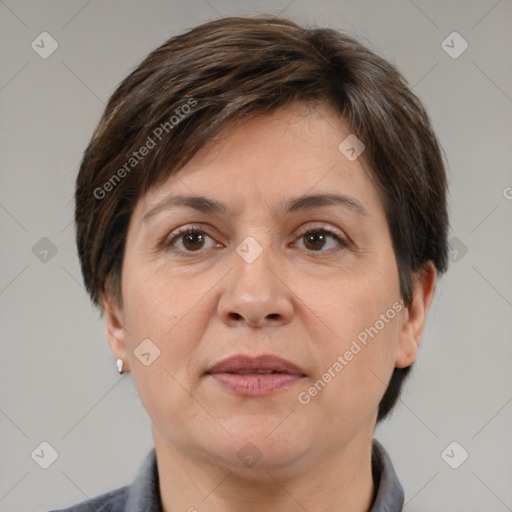 Joyful white adult female with short  brown hair and brown eyes